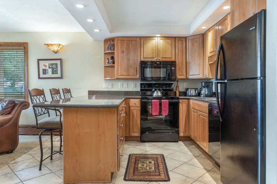 Stocked kitchen with everything you need to cook meals in the unit!