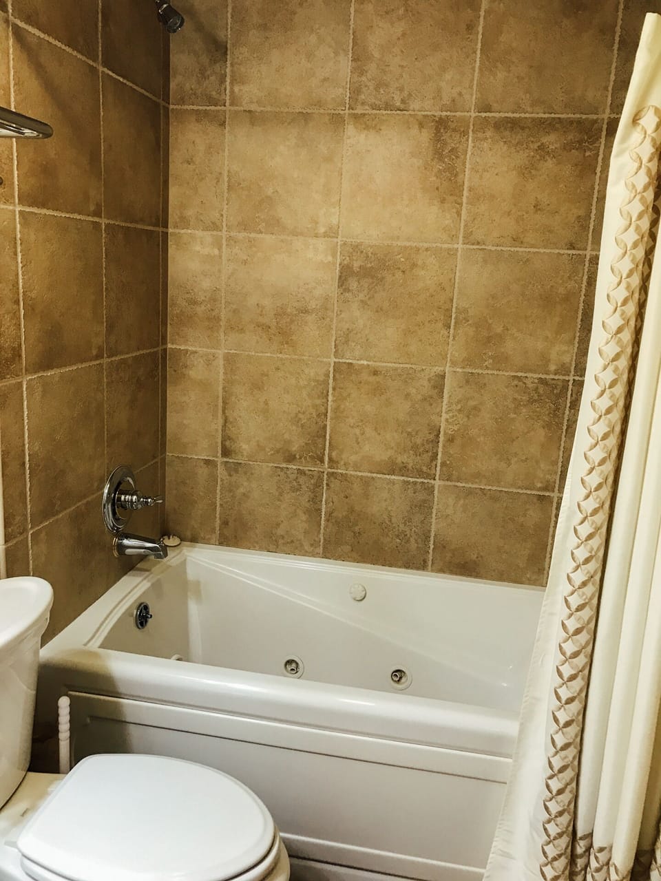 Relax after a long day on the slopes in guest bath tub/shower.  