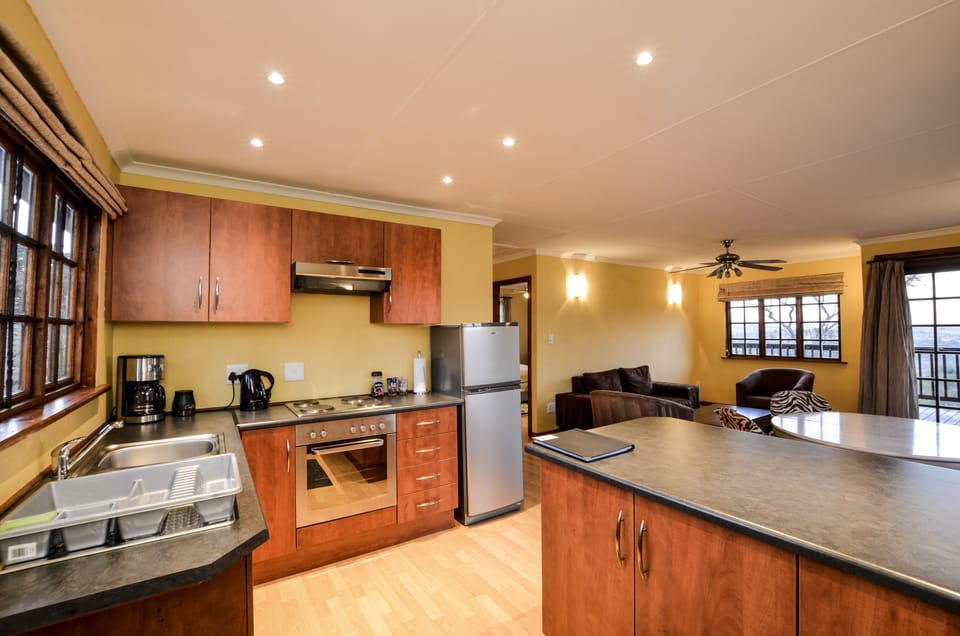 Gogo's Cottage | Private kitchen | Coffee/tea maker, electric kettle