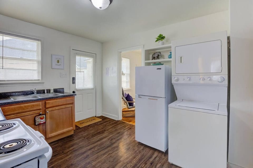 Full laundry setup with an in-unit washer and dryer.
