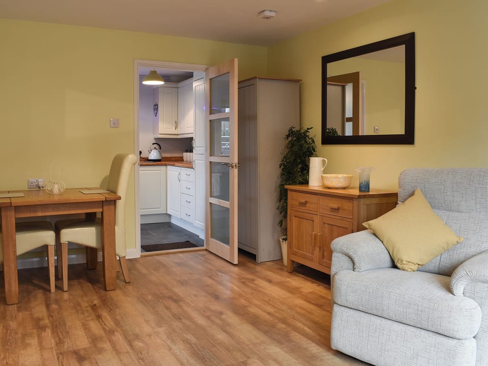 Living room with dining area | Old Orchard Cottage, Trethurgy, near St Austell