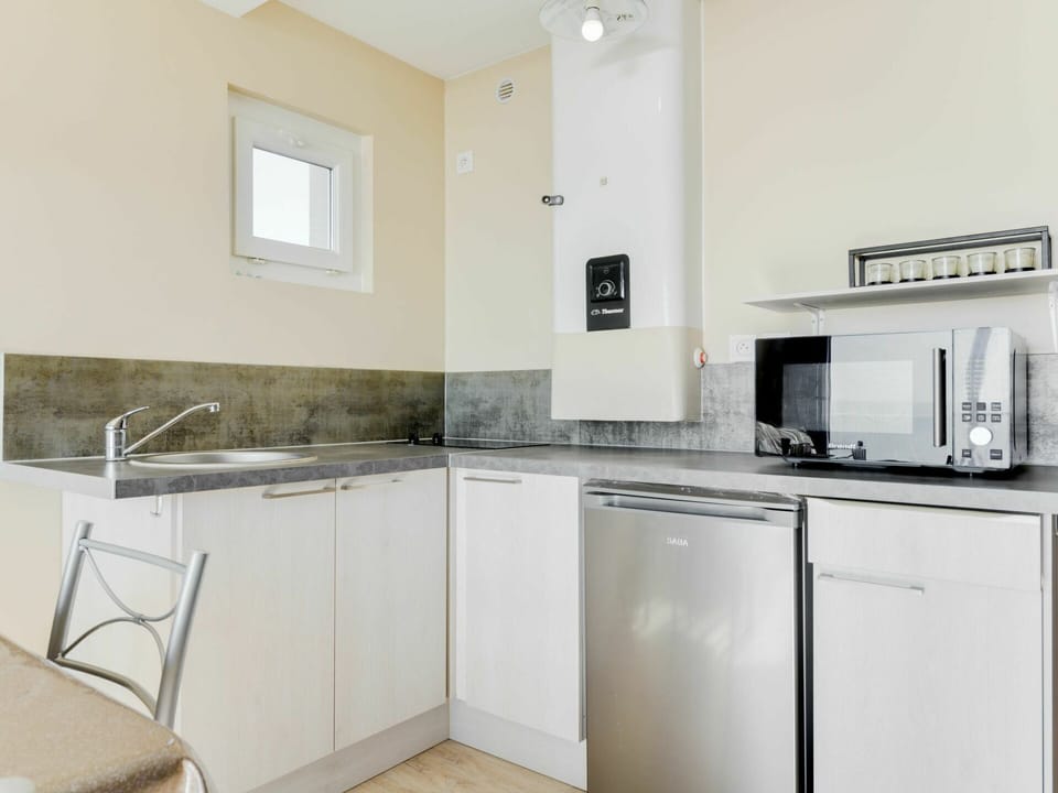 Countertop, Cabinetry, Kitchen Sink, Sink, Building, Kitchen Appliance, Kitchen, Kitchen Stove, Home Appliance, Tap