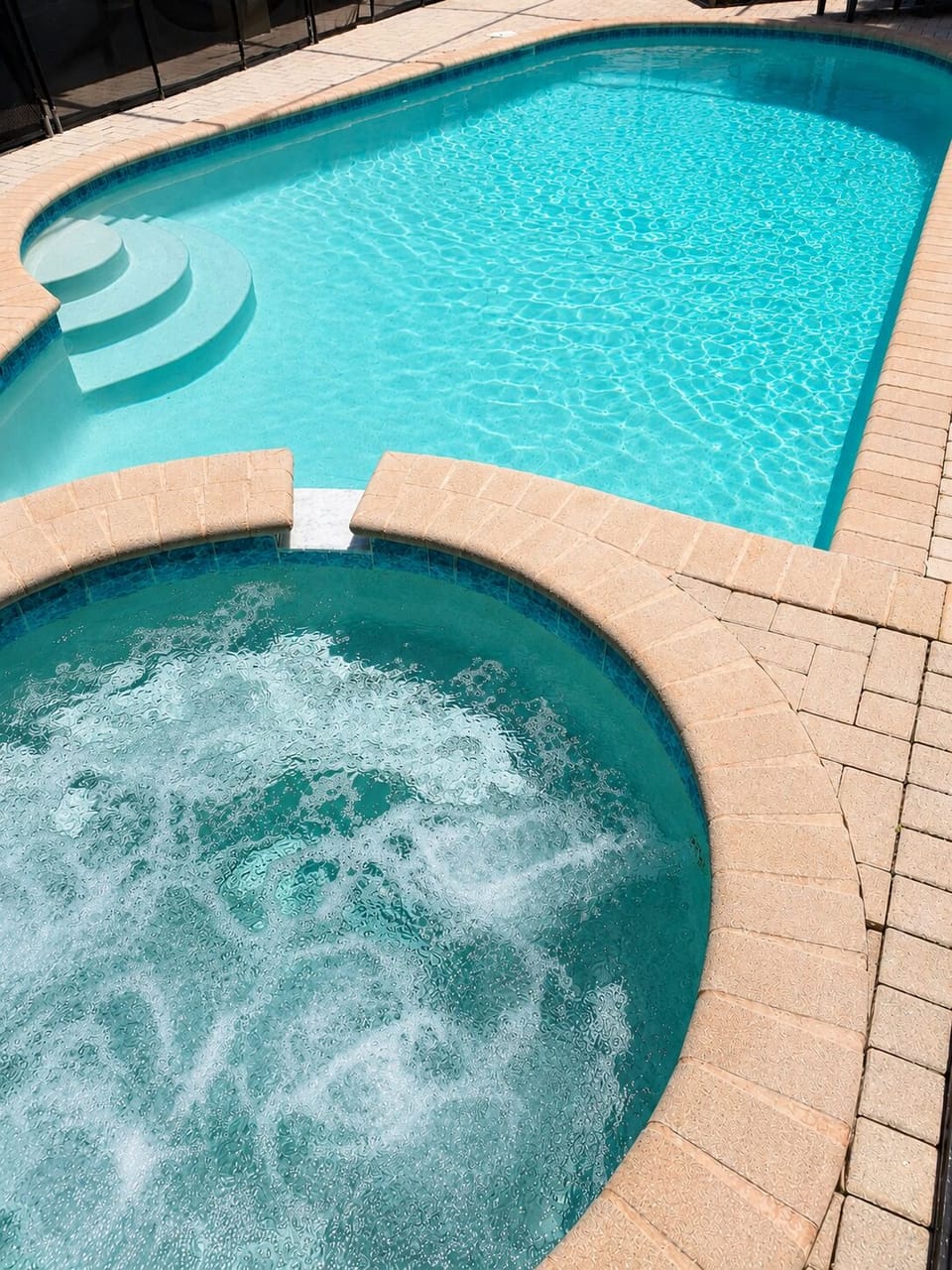     Private pool & bubbling spa inside your screened-in lanai
