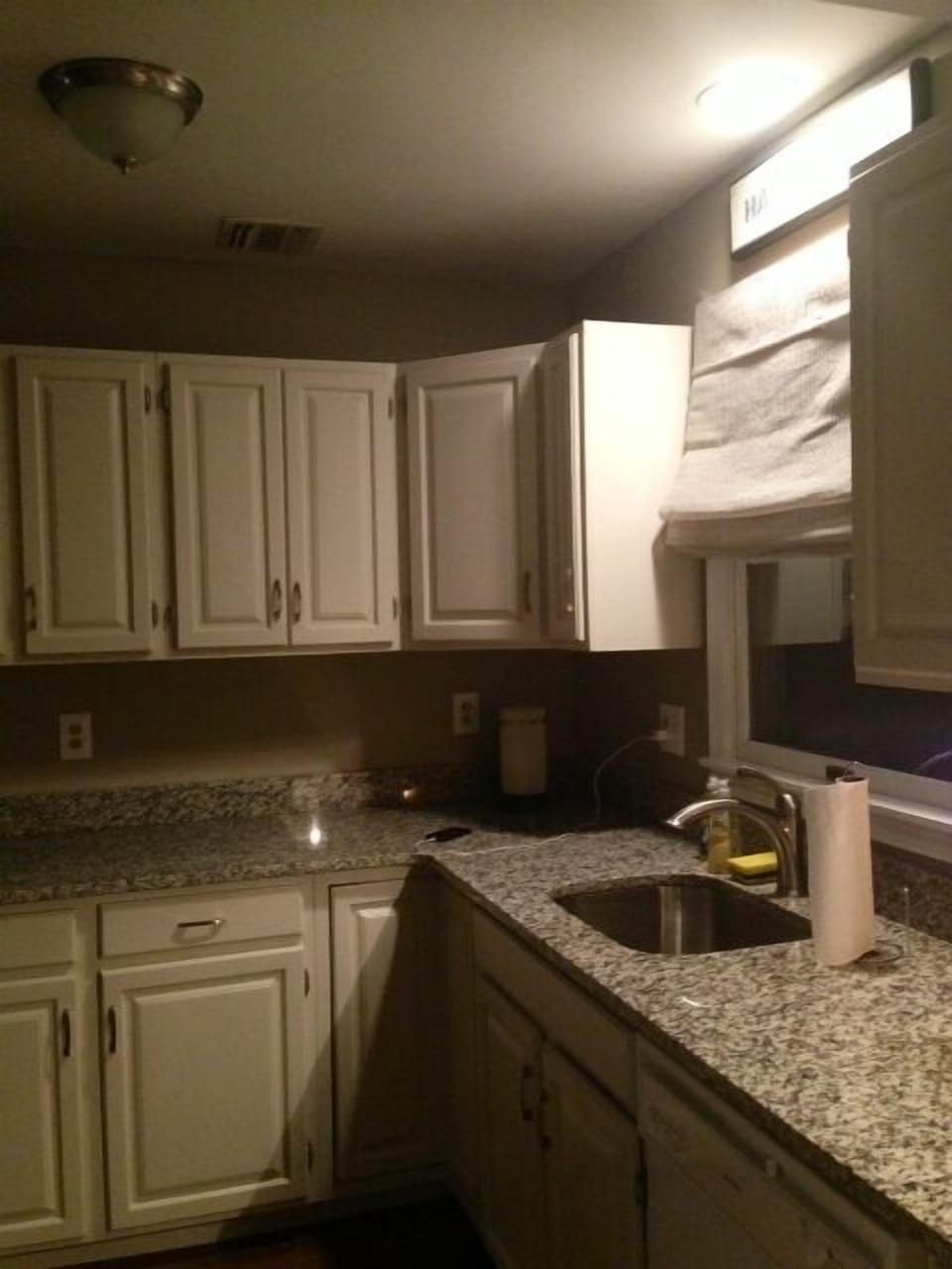 Kitchen with granite counter tops, dish washer, microwave, fully stocked!