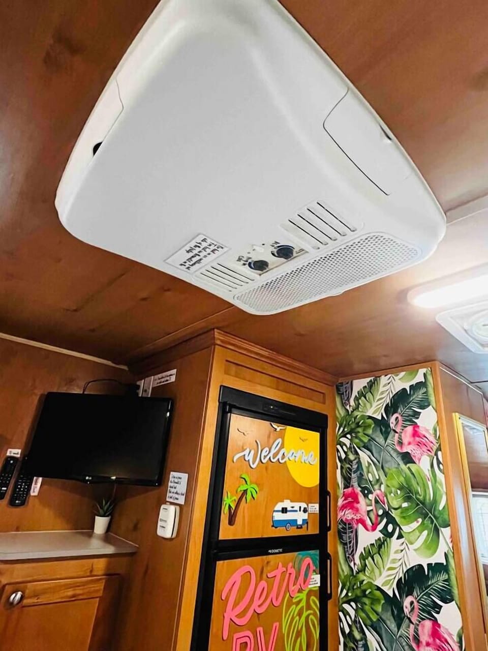 Control the fan and temperature from the unit on the ceiling. 