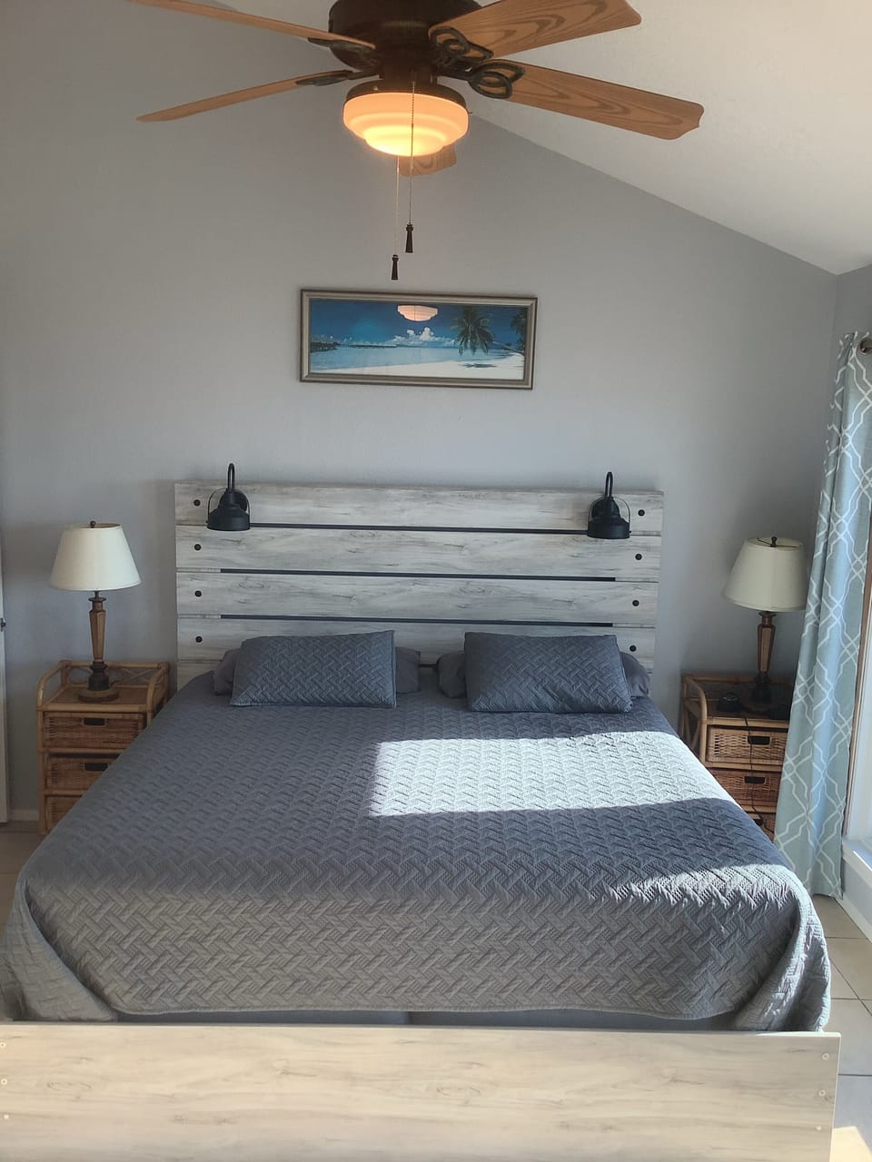 Primary en suite with a King bed and 55” smart tv