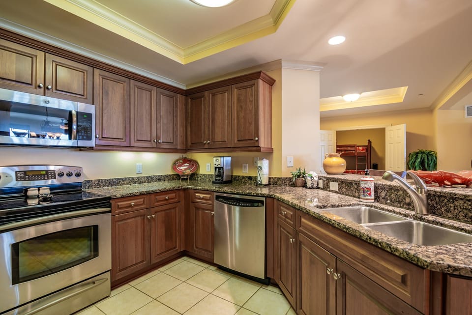 Fully Equipped Kitchen with Granite Counter Tops, Wine Refrigerator and Stainless Appliances