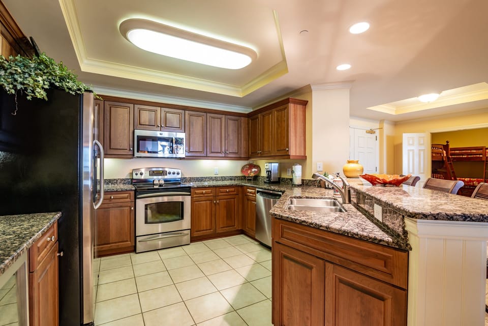 Fully Equipped Kitchen with Granite Counter Tops, Wine Refrigerator and Stainless Appliances