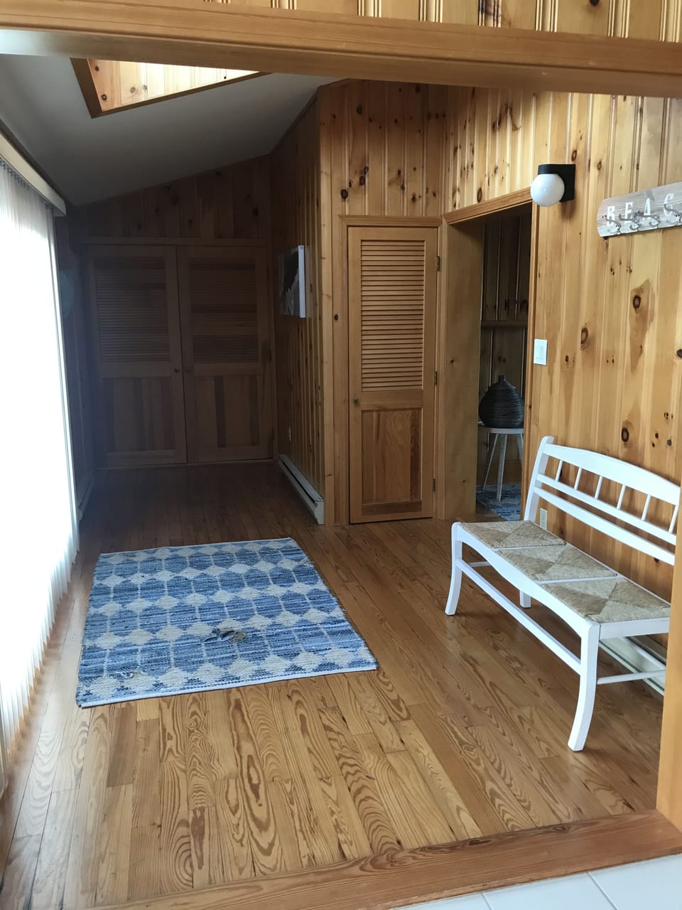 Hallway.... full bathroom left, laundry straight, entrance to livingroom right 