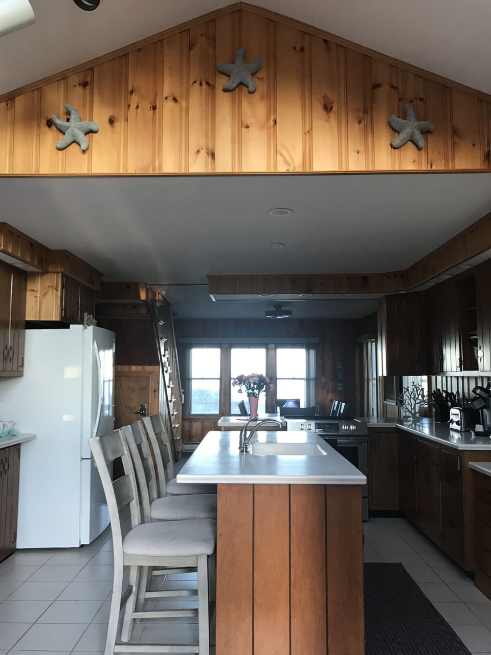 Upon entering home.  Kitchen dining room and ocean view