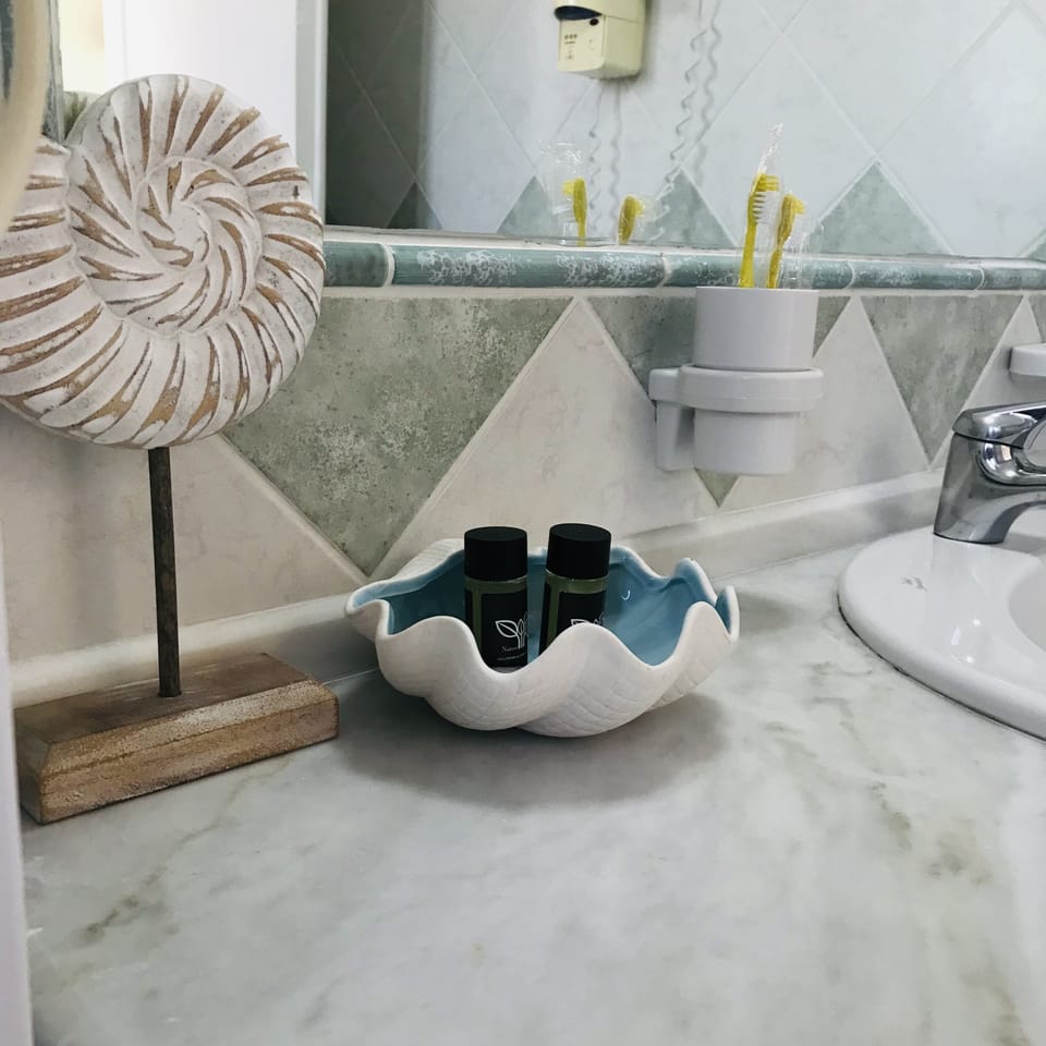 Basic Studio, 1 Double Bed with Sofa bed | Bathroom | Shower, rainfall showerhead, hair dryer, slippers