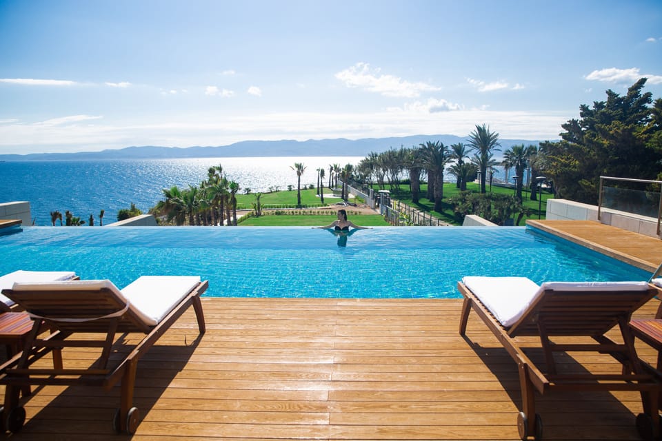 3 indoor pools, outdoor pool, open 9:00 AM to 7:00 PM, pool umbrellas