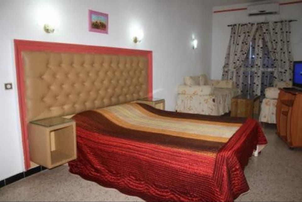 Standard Double Room | Minibar, desk, blackout drapes, rollaway beds