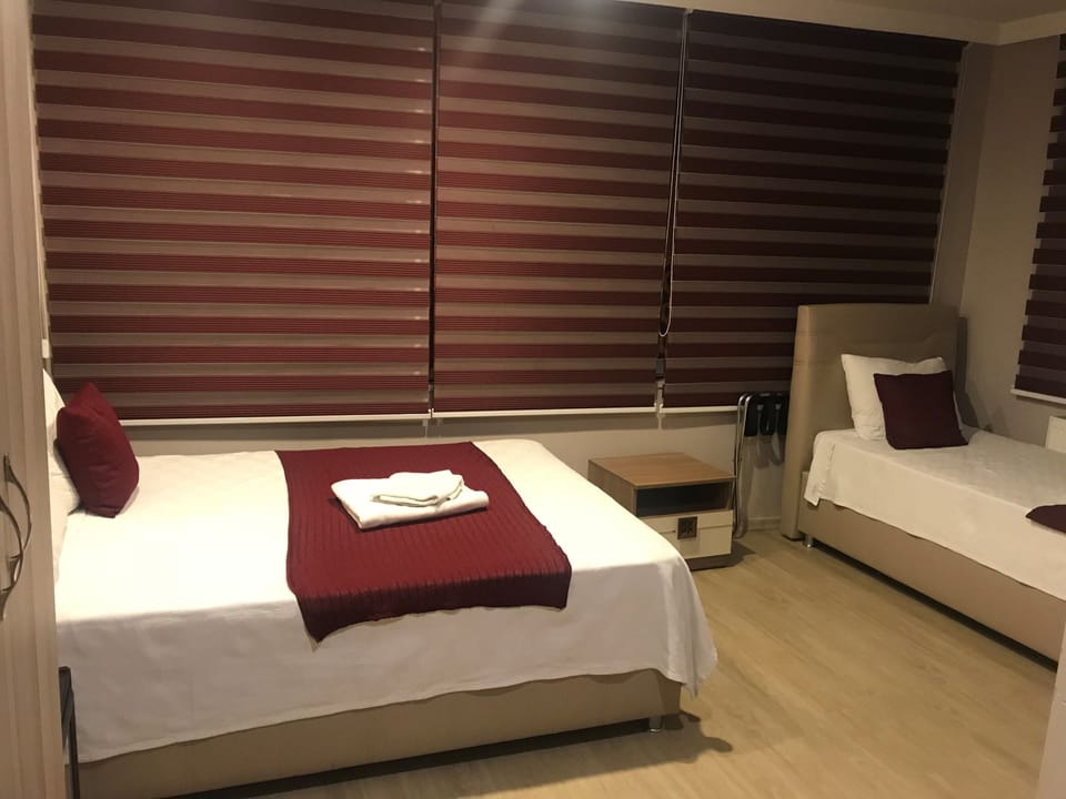 Standard Triple Room | 1 bedroom, minibar, in-room safe, soundproofing