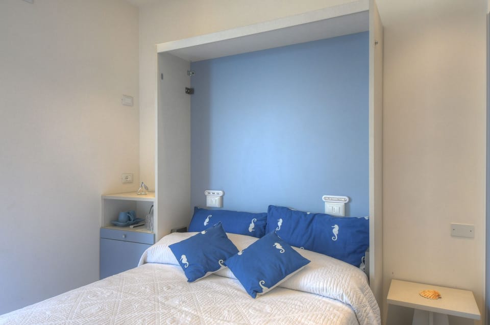 Double Room, Terrace, Sea View | Free minibar items, in-room safe, individually furnished, desk