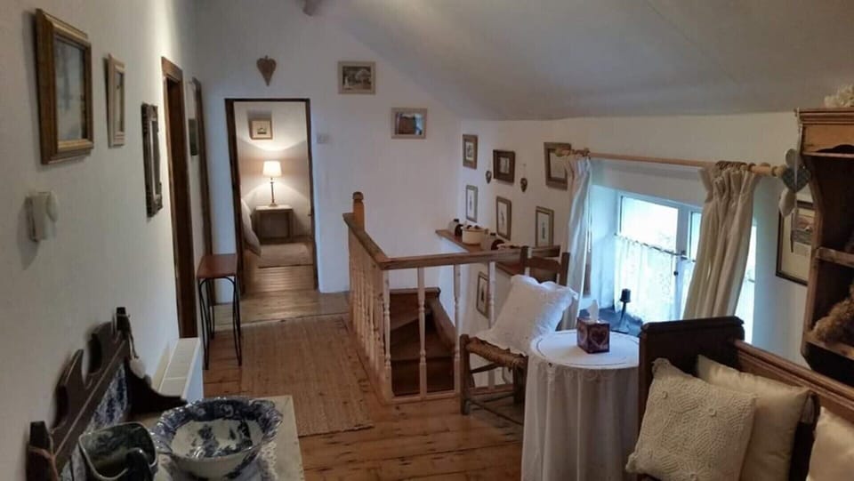 Cottage | Living room | 30-inch TV with satellite channels, fireplace