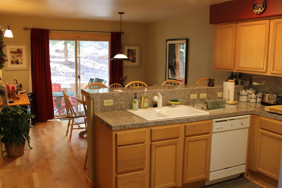 kitchen and dinning room seats 8 at table and 4 at counter.Patio out back