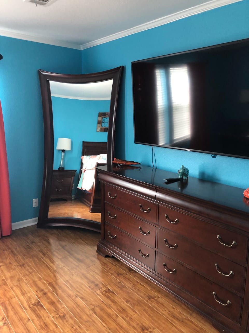4 oversized TVs throughout the house. One in each bedroom too. 