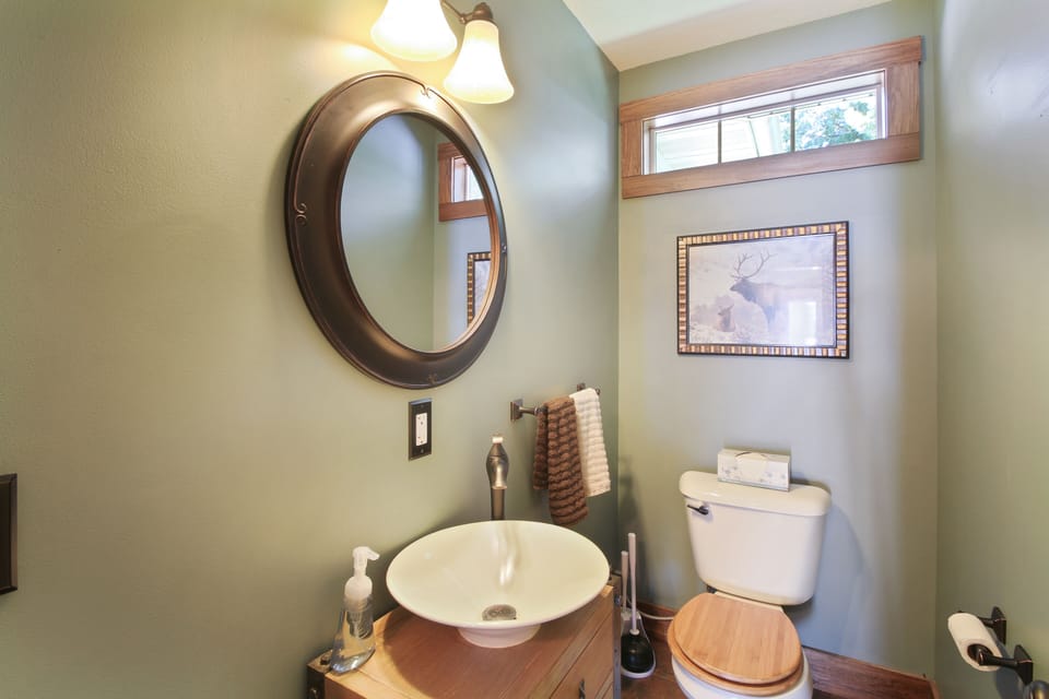 Bathroom off of the Kitchen and access to the bedrooms
