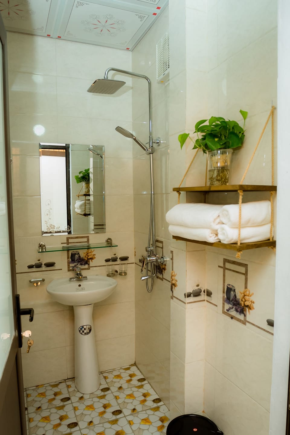 Shower, hydromassage showerhead, designer toiletries, hair dryer