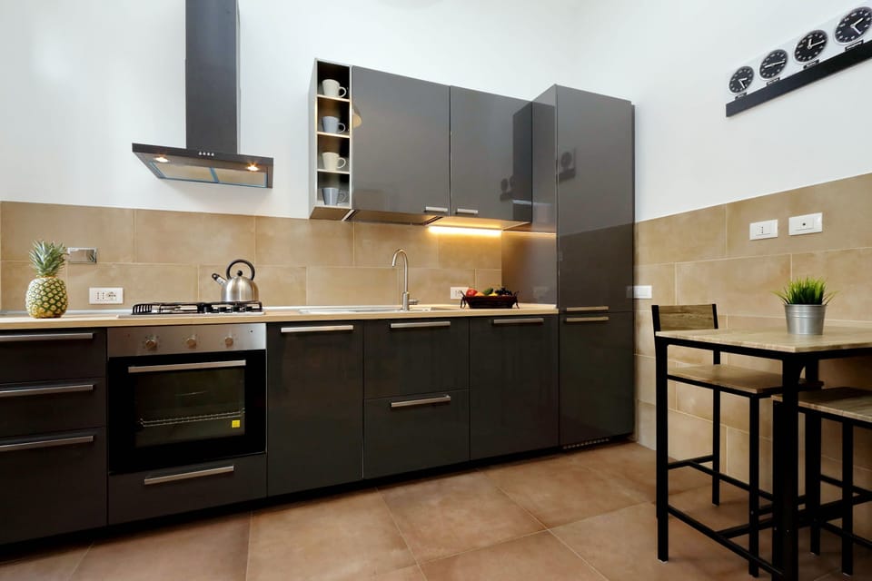 Apartment, 2 Bedrooms | Private kitchen | Full-size fridge, oven, stovetop, dishwasher