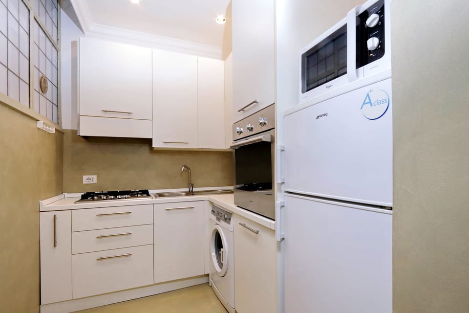 Apartment, 2 Bedrooms | Private kitchen | Full-size fridge, microwave, oven, stovetop