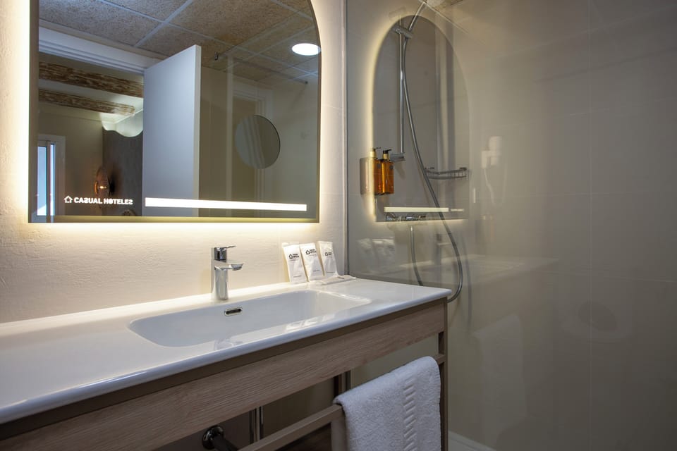 Shower, free toiletries, hair dryer (on request), towels