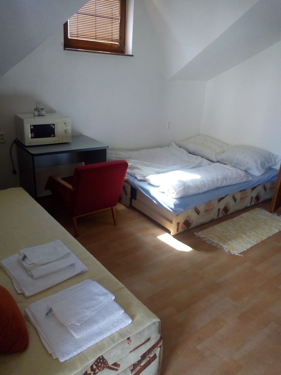 Apartment | Desk, bed sheets
