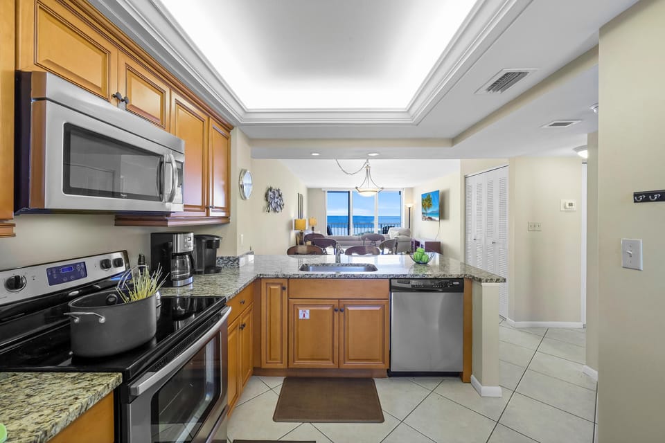 Condo, Multiple Beds (Stylish beachfront condo with pool an) | Private kitchen | Fridge, microwave, oven, stovetop