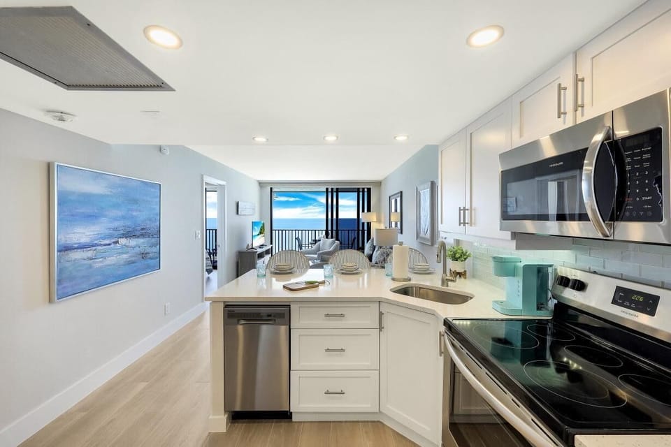 Condo, 1 Queen Bed with Sofa bed (Charming beachfront condo with pool, ) | Private kitchen | Fridge, microwave, oven, stovetop