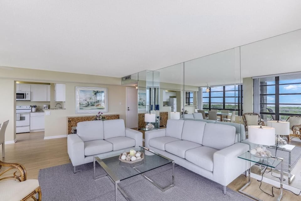Condo, 1 King Bed (Front unit facing beach with wraparou) | Living room | Flat-screen TV