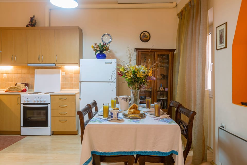 Apartment, 2 Bedrooms | Private kitchen | Full-size fridge, oven, stovetop, cookware/dishes/utensils