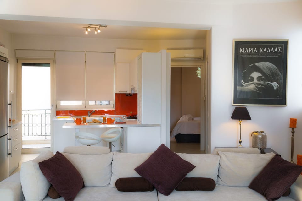 Apartment, 1 Bedroom | Living room | Flat-screen TV