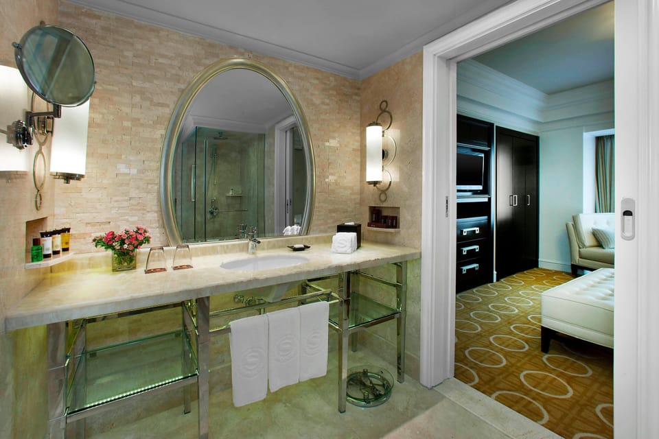 Club Suite, 1 King Bed | Bathroom | Combined shower/tub, rainfall showerhead, designer toiletries