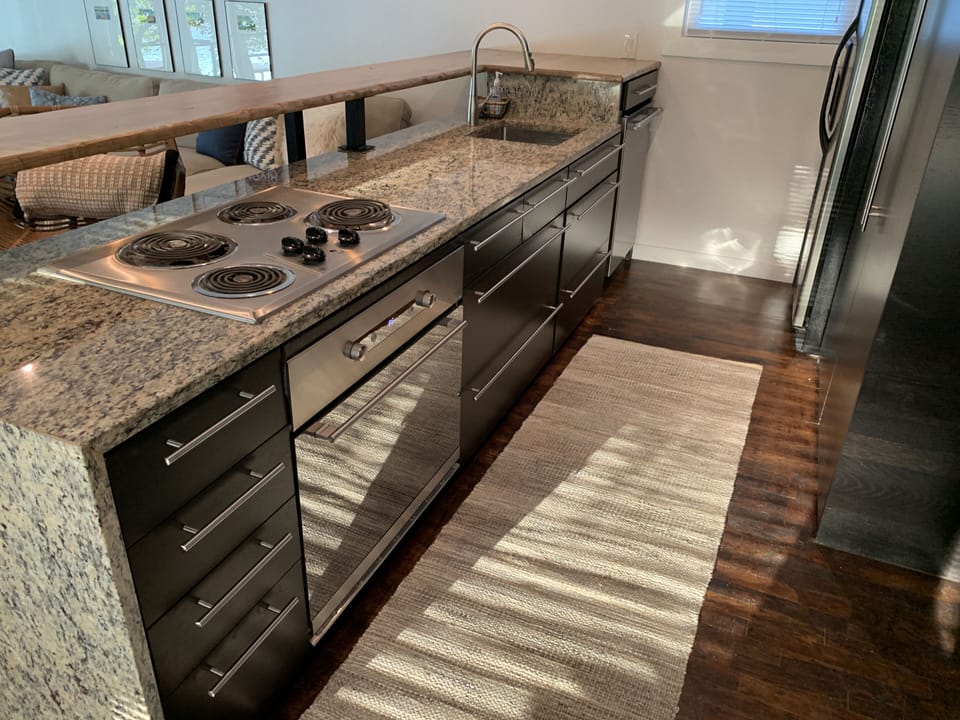 Kitchen equipped w/ Refrigerator/Freezer, Microwave, Oven, Stove, & Dishwasher