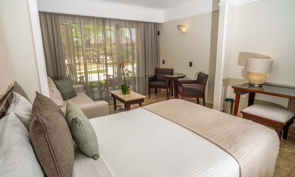 Junior Suite Pool Access | Premium bedding, free minibar, in-room safe, desk