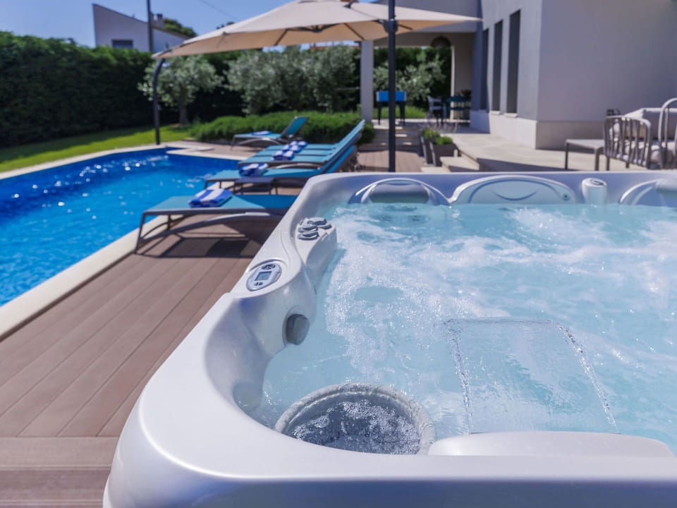 Water, Plant, Property, Swimming Pool, Azure, Building, Outdoor Furniture, Tree, Rectangle