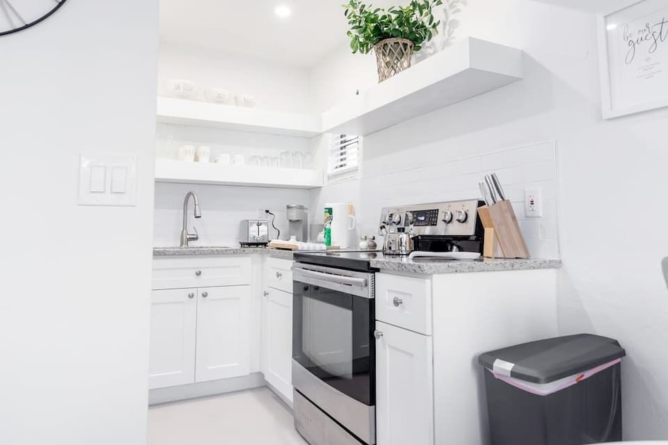 Fully functioning kitchen complete with  cooking utensils 