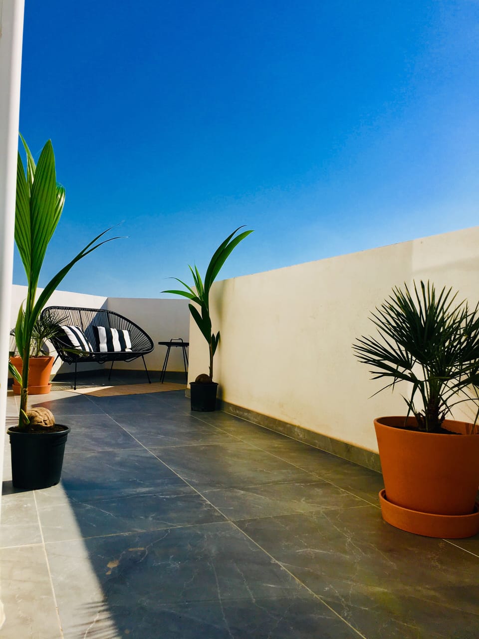 Second lounge area with distant sea and country views