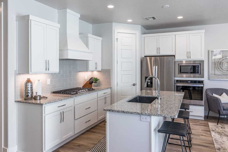 Kitchen - The Kitchen is complete with everything you will need for meal preparations including pots, pans, baking dishes, plates, cups, silverware, cutlery, and an assortment of cooking utensils.