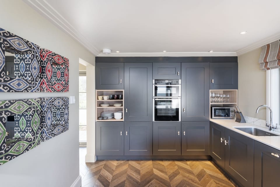 Kitchen with coffee machine, oven and hob, toaster, kettle & dishwasher - Beam Ends