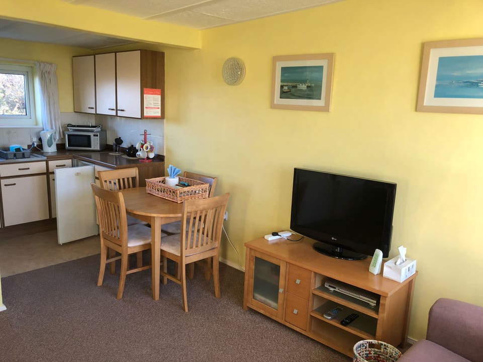 Dining room and kitchen.
