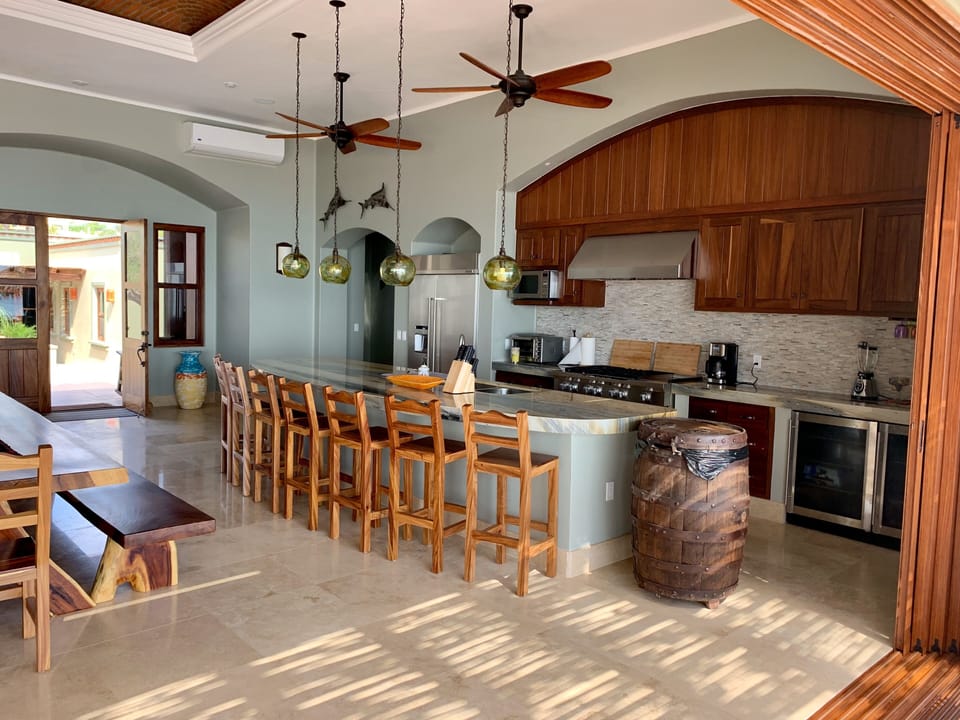 Professional Kitchen
With  8 bar stools
2 beverage fridges 