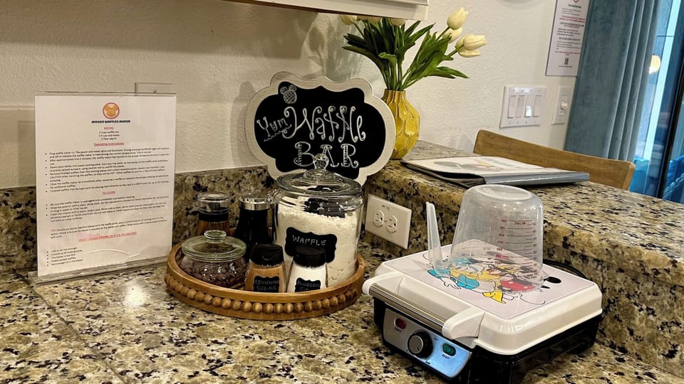 Waffle bar with mix & toppings—perfect for an easy morning after travel!