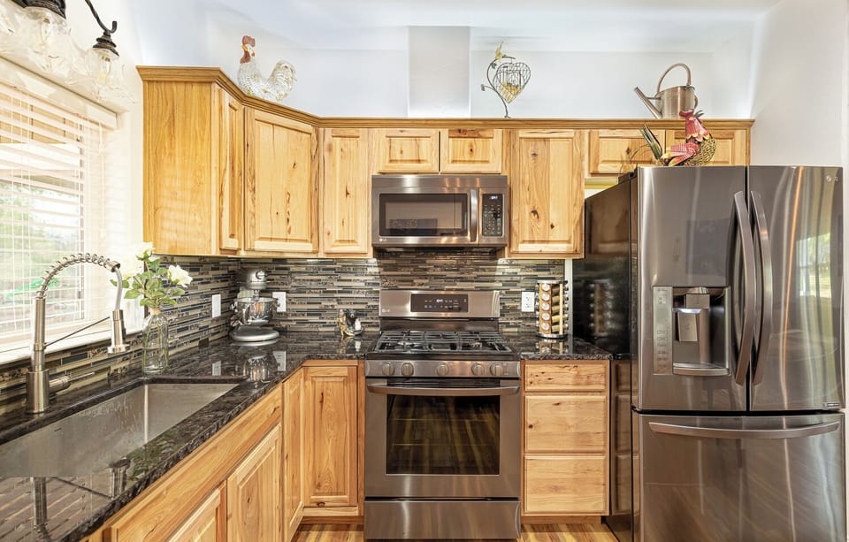 Large modern kitchen with everything you could possibly need for fixing a meal