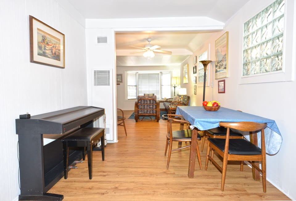 317CA - Dining Table and Piano.jpg