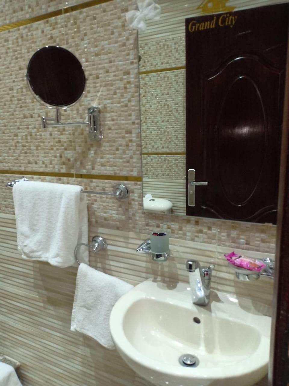 Shower, hair dryer, slippers, towels
