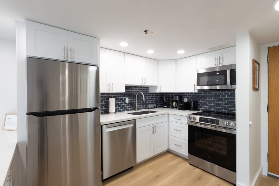 Renovated kitchen with sleek stainless-steel appliances