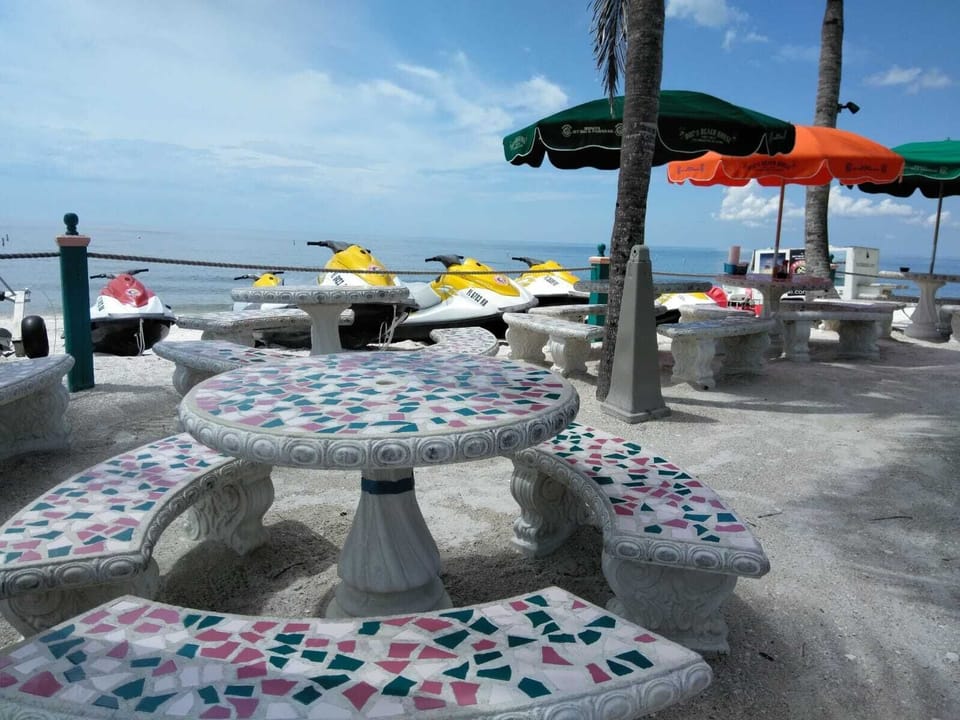 beach sunset watch seating and drinks