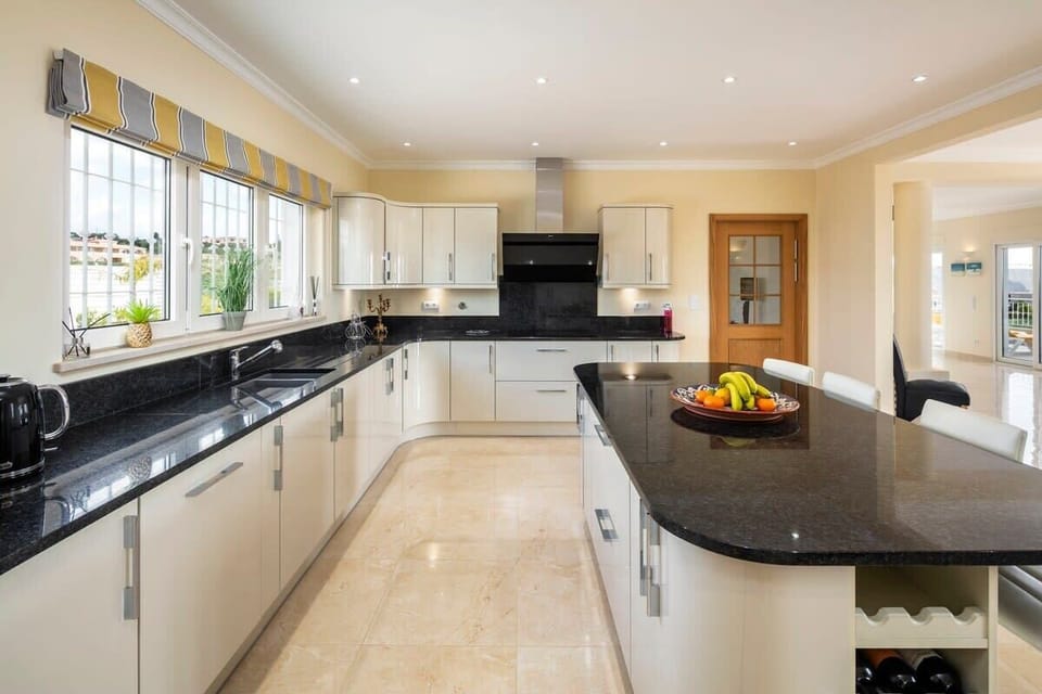 Bright kitchen with island and breakfast bar
